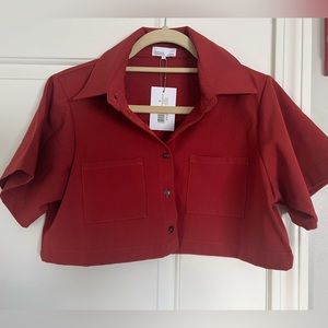 New with tags.WeWoreWhat rusty colored cropped blouse. Matching trousers listed